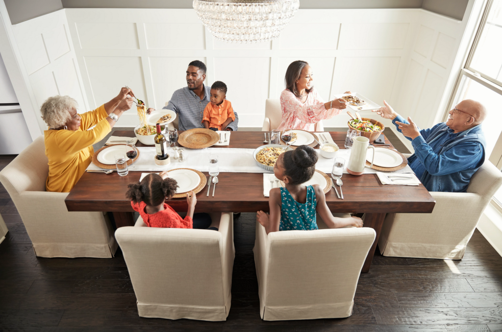Family having breakfast at the dining table | Puckett's Flooring